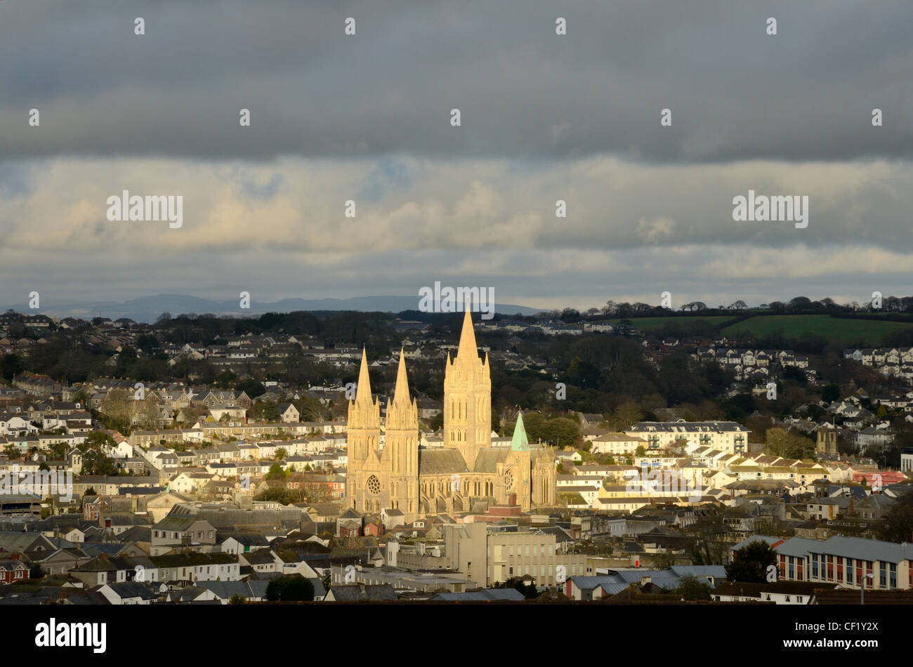 View of Truro on a generally cloudy day but with the Cathedral picked out in a shaft of sunlight Stock Photo