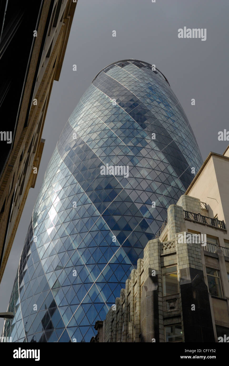 30 St Mary Axe, also known as the Gherkin, the second tallest building in the City of London. Stock Photo