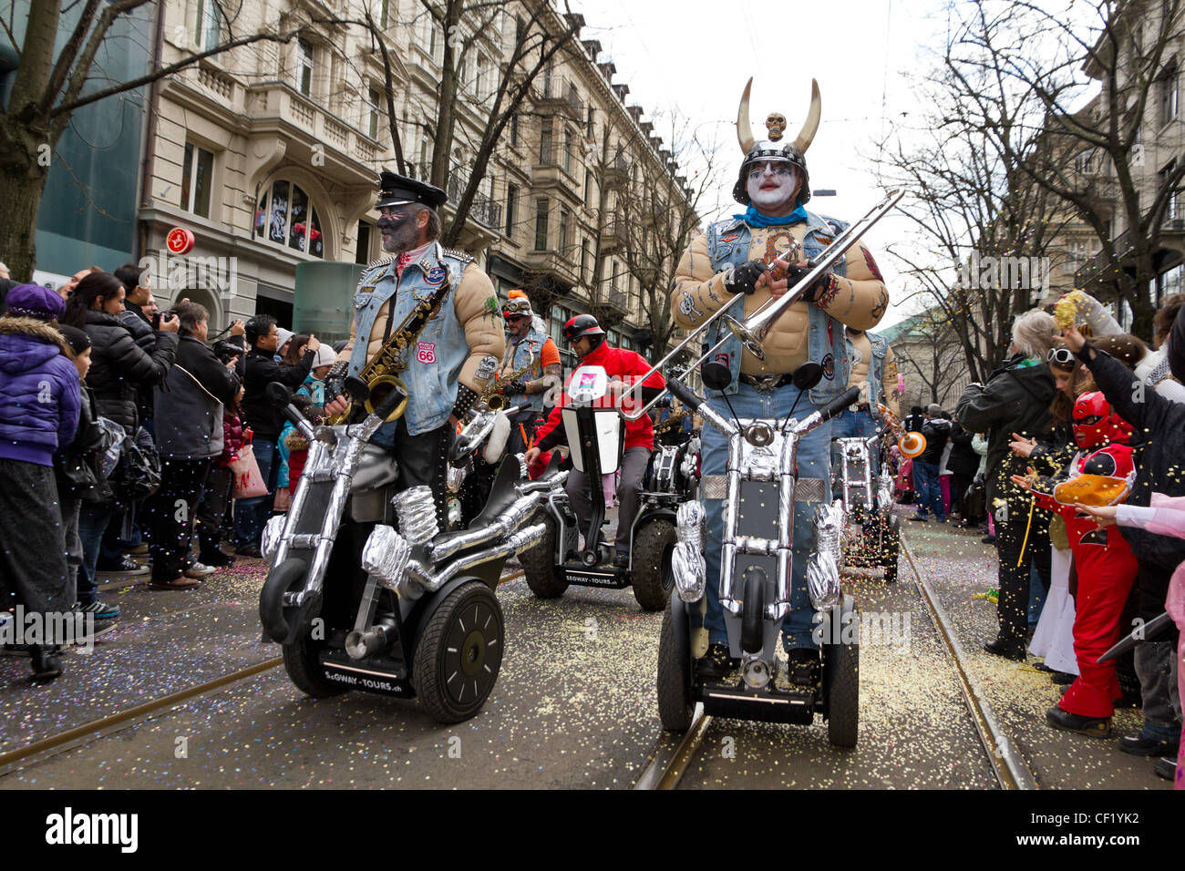 Participants in costumes perform a street procession of ZueriCarneval Fasnacht February 26, 2012 in Zurich, Switzerland. Stock Photo