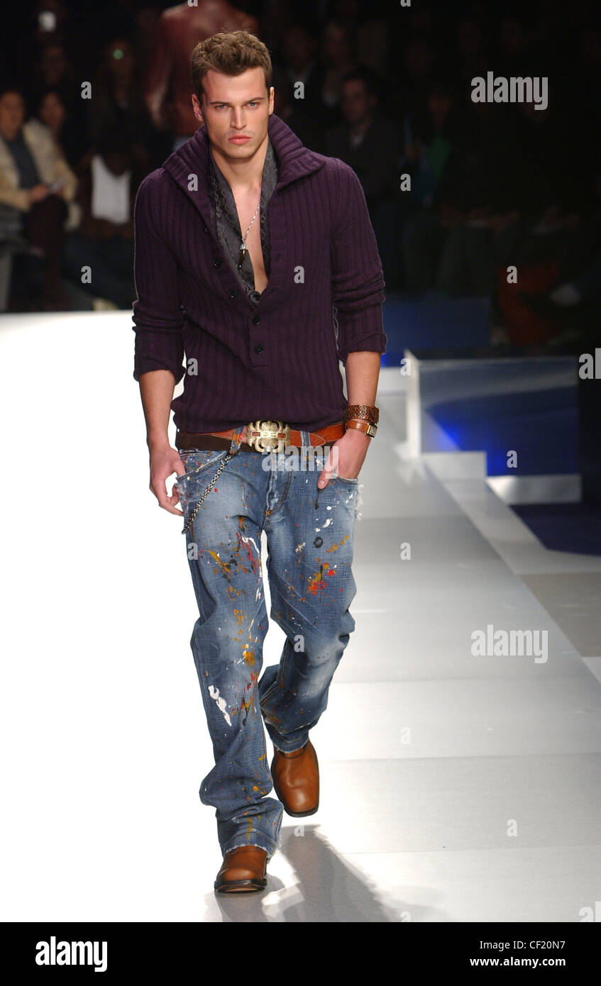 Dolce and Gabbana Milan Menswear Ready to Wear Autumn Winter Purple jumper  and customised baggy jeans Stock Photo - Alamy