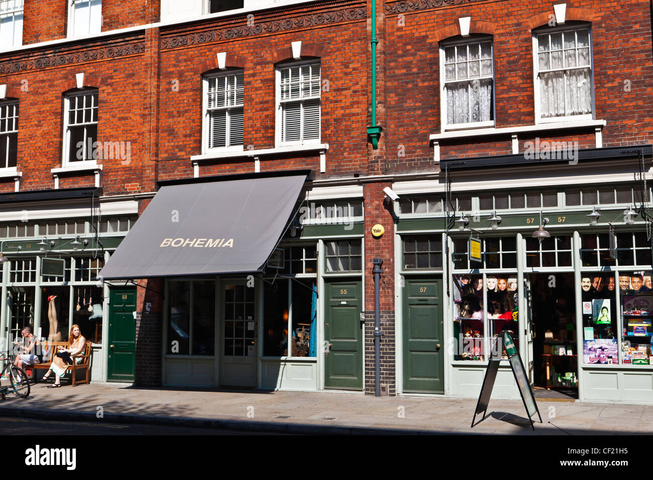 An eclectic mix of shops on Brushfield Street, Spitalfields, in the East End of London. Stock Photo