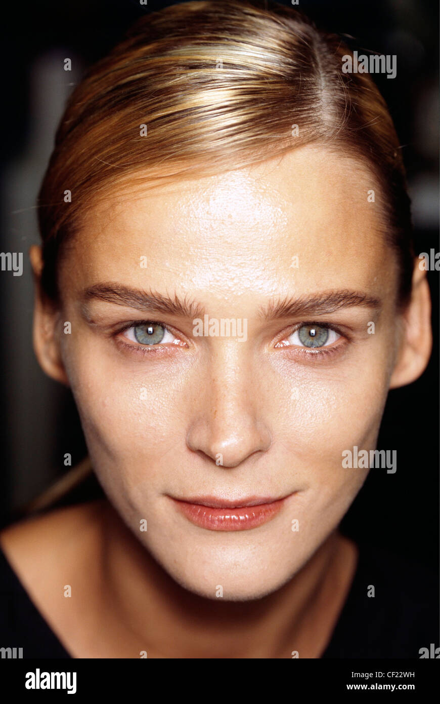 Prada Backstage Milan Ready to Wear S S Head shot of Estonian model Carmen  Kass hair pulled back, half smiling and looking Stock Photo - Alamy
