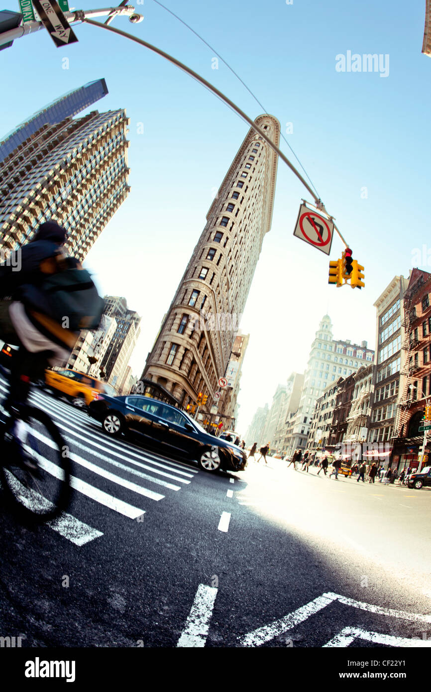 The Flatiron wedge shaped building in New York shooting into the sun
