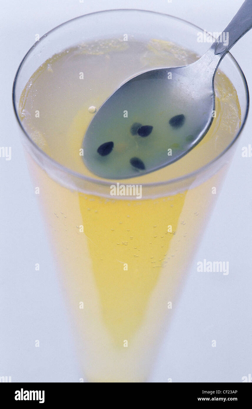 Party Drinks Everyday drinks are all very well, but there's nothing as celebratory as a cocktail Passion fruit cocktail Stock Photo