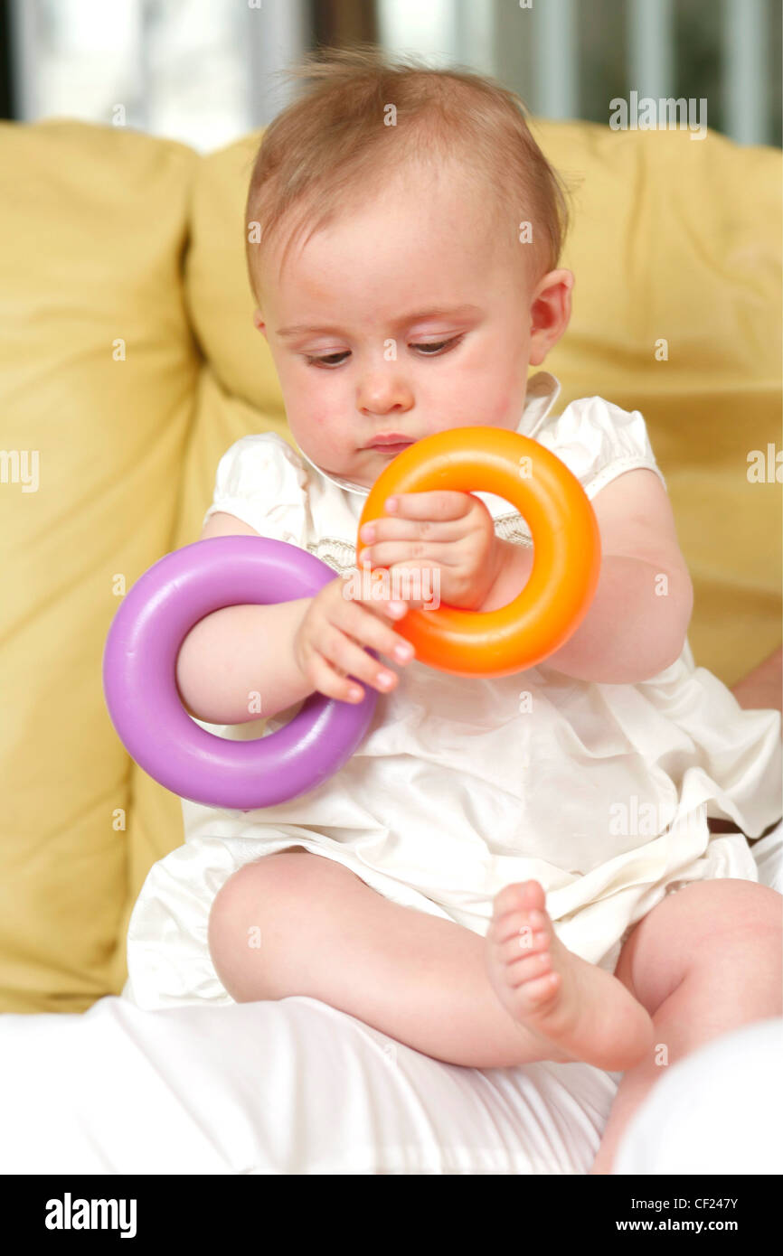 baby wearing rings