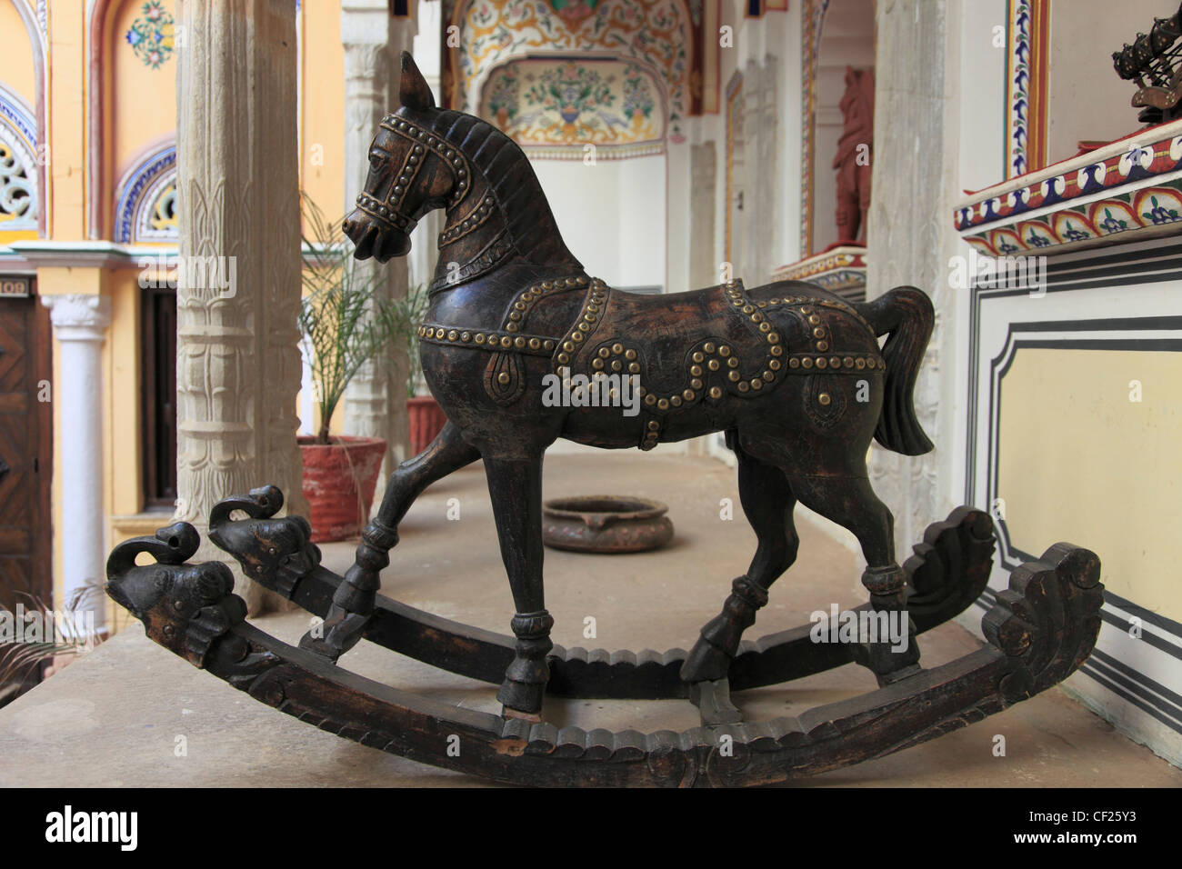 India, Rajasthan, Shekhawati, Nawalgarh, Grand Haveli, rocking horse, Stock Photo