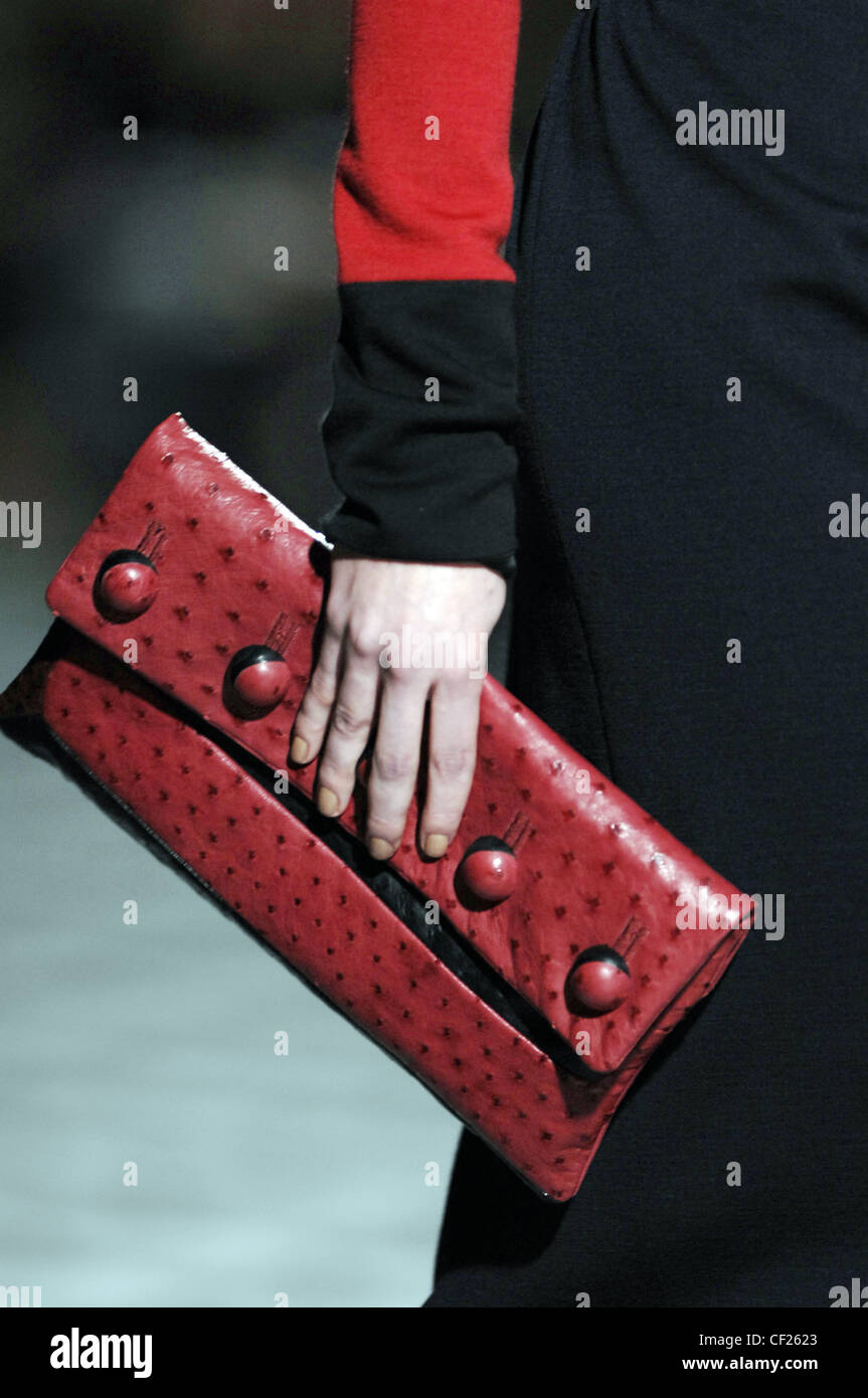 Marc Jacobs New York Accessories Autumn Winter Close up of red and black  ostrich leather clutch with covered buttons Stock Photo - Alamy