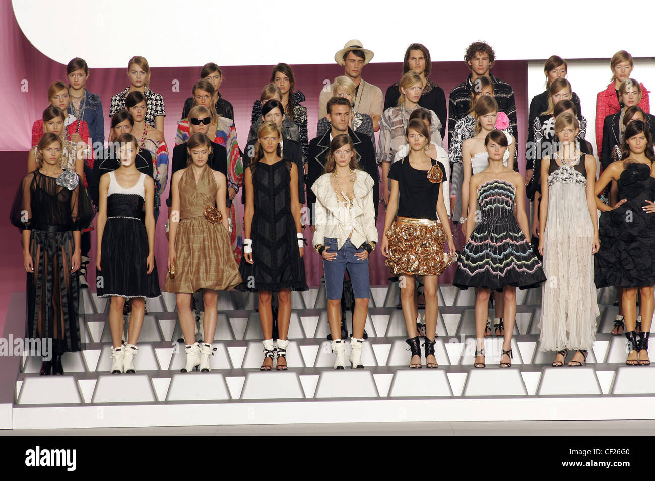 Chanel Paris Ready to Wear S S Group shot of thirty two female models and four male models standing in rows on steps Carmen Stock Photo