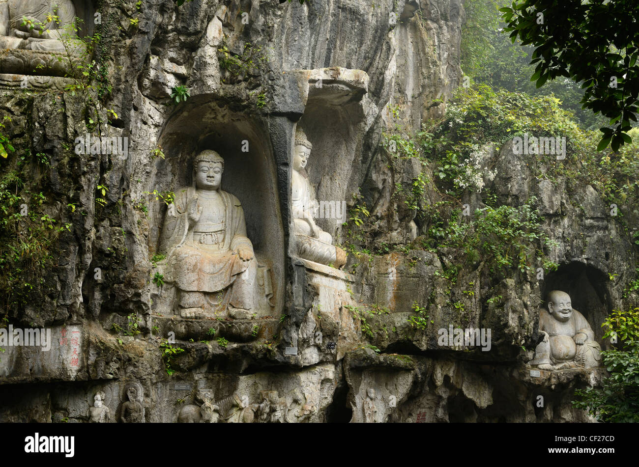 Limestone cliff at Feilai Feng with Buddhist sculptures at Ling Yin temple Hangzhou China Stock Photo