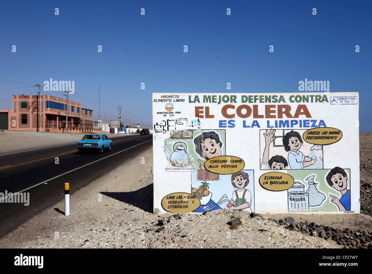 Sign educating people that cleanliness and hygiene is the best way to prevent cholera on road near Ilo, Peru Stock Photo