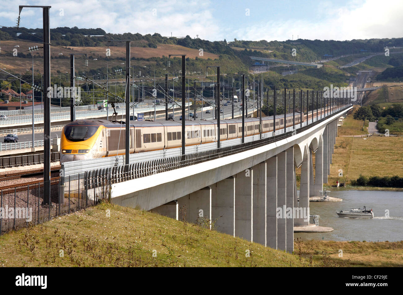 A Eurostar train crossing a bridge over the River Medway on High Speed 1, a high speed railway line linking London to the Britis Stock Photo