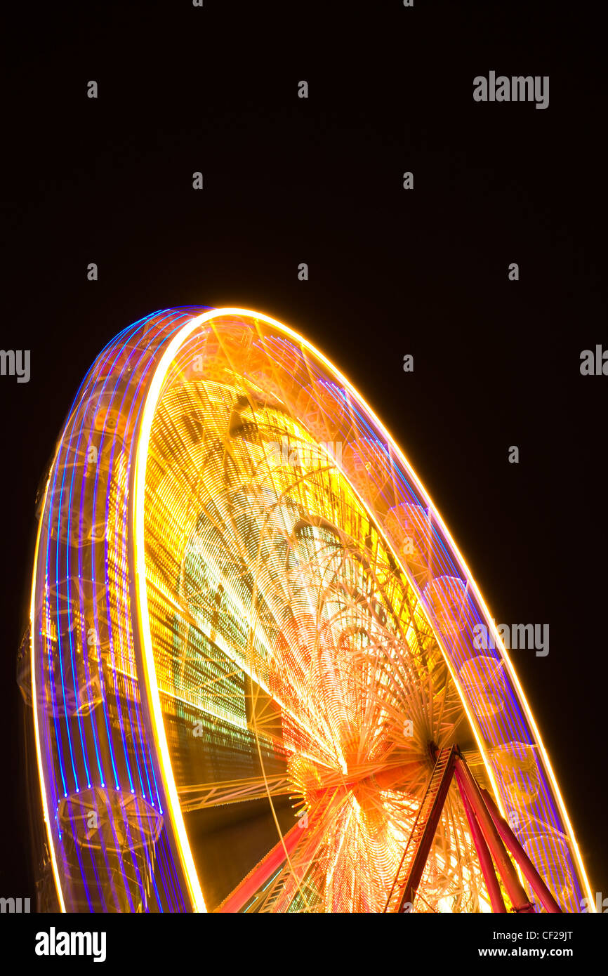 Edinburgh Christmas Fair. Ferris wheel located near the Scott Monument in East Princes Street Gardens. Stock Photo