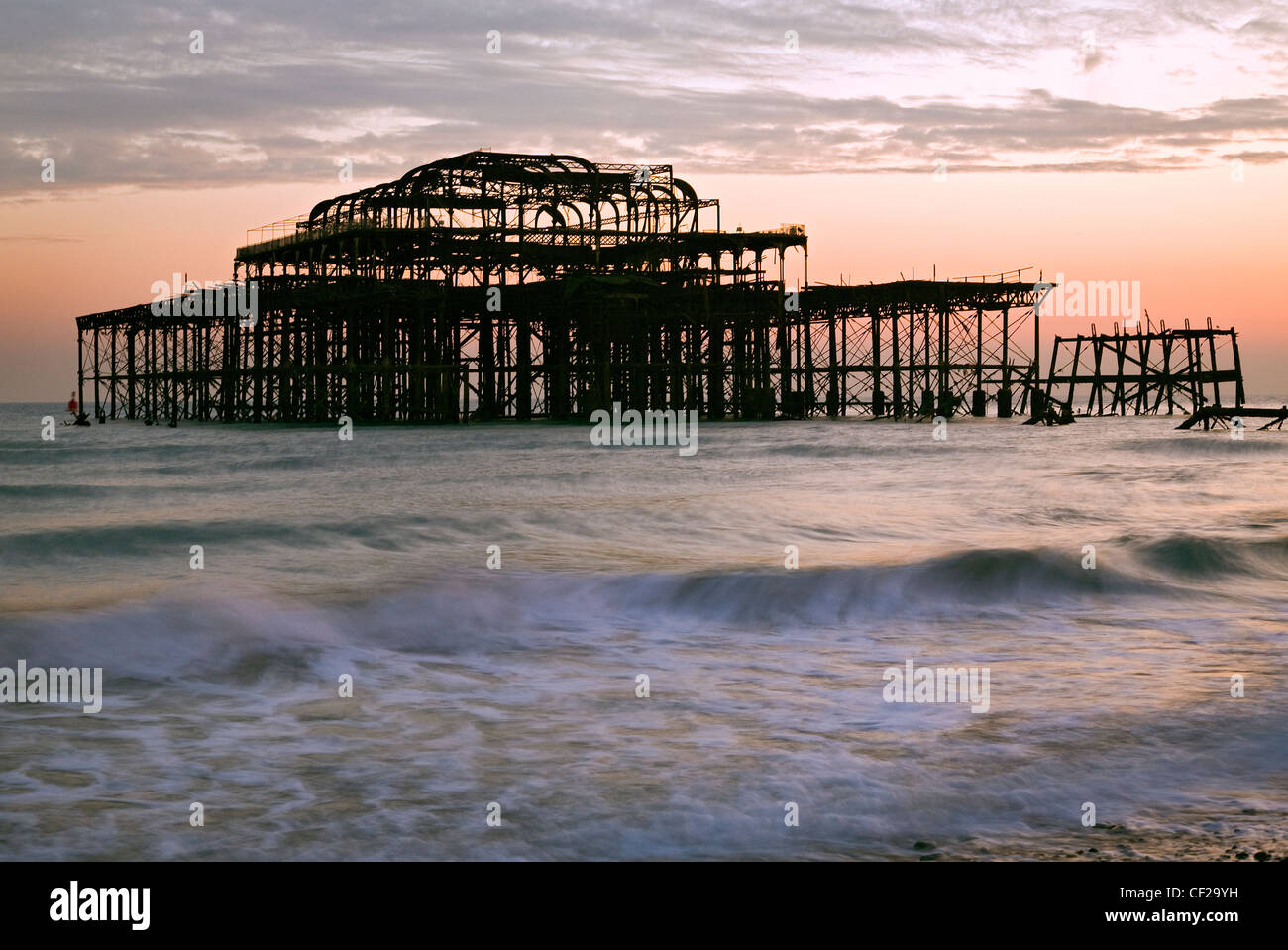Sunset over Brightons decaying West Pier. Stock Photo