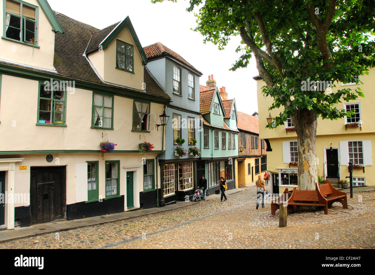 Buildings dating back to Tudor times in the historic cobbled lane of Elm Hill. Stock Photo
