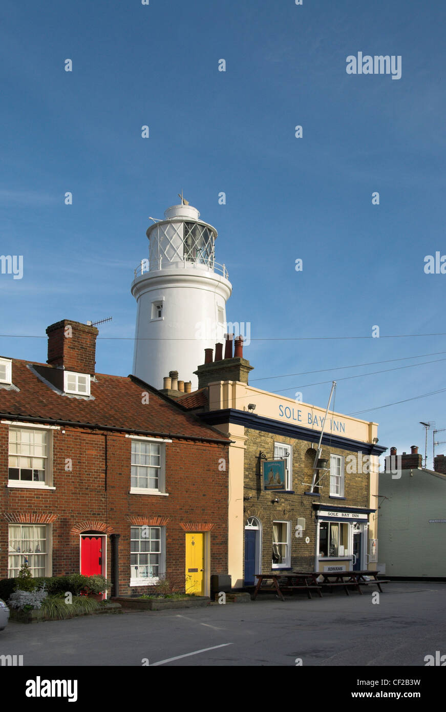 The Sole Bay Public house and Southwold lighthouse Stock Photo Alamy