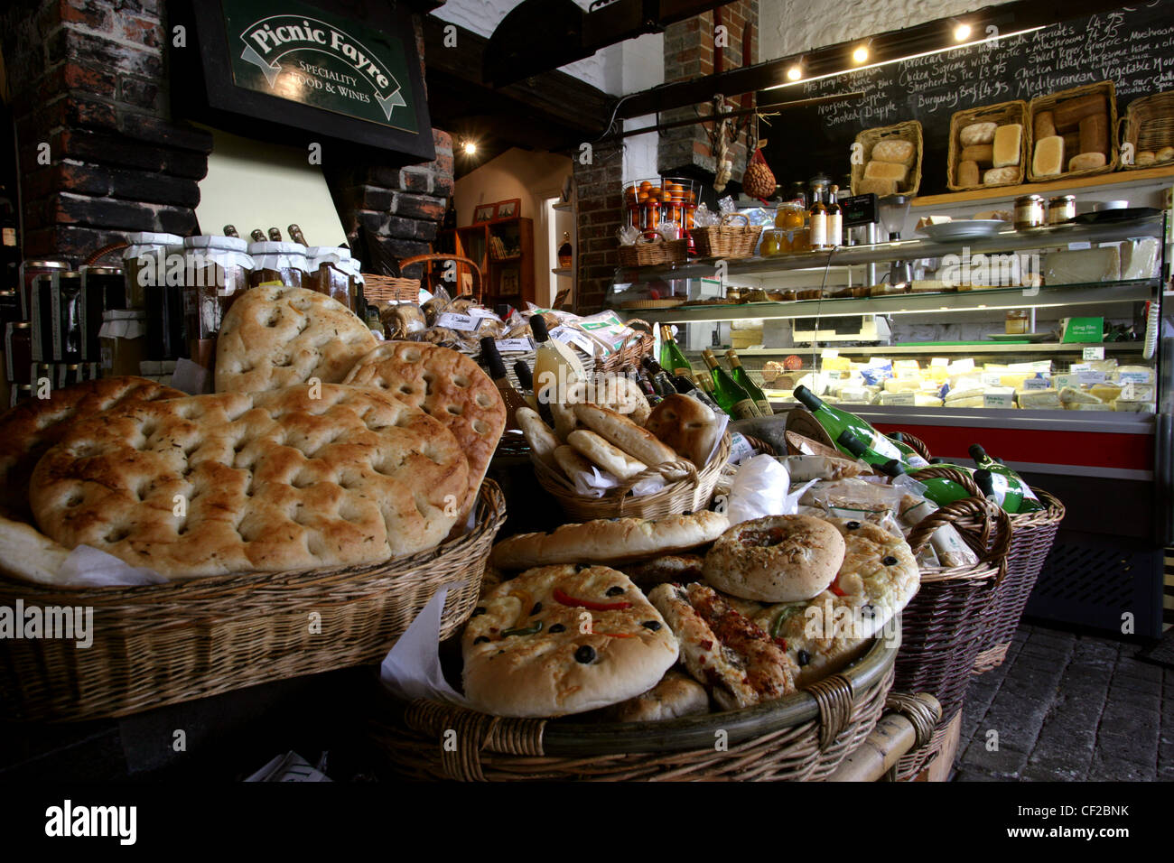 Detail image of Picnic Fayre Delicatessen shop set in the Old Forge, Cley next the Sea, Norfolk, UK Stock Photo