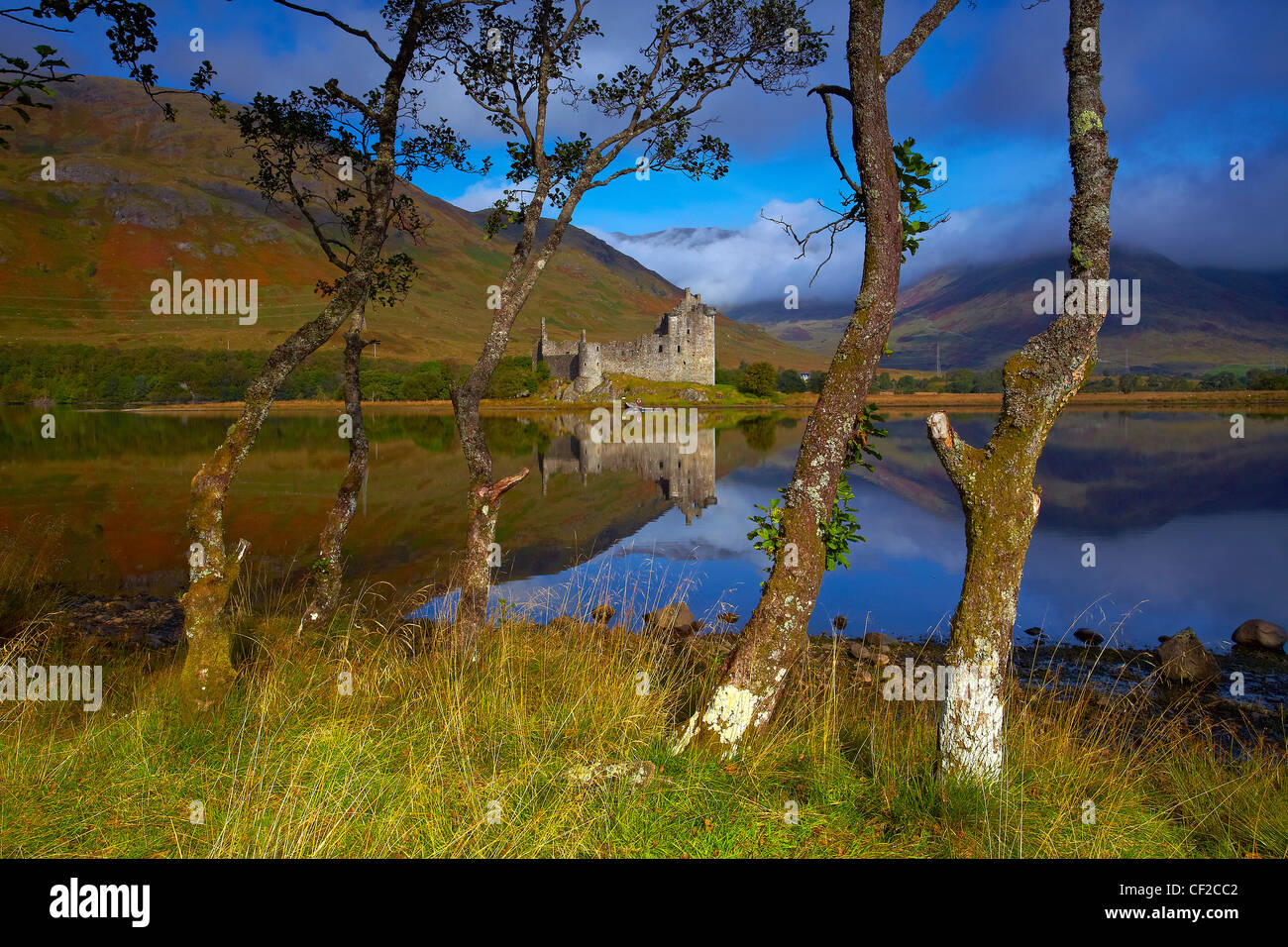 Kilchurn Castle, a ruined 15th century tower house by Loch Awe. It incorporates the first purpose-built barracks in Scotland. Stock Photo