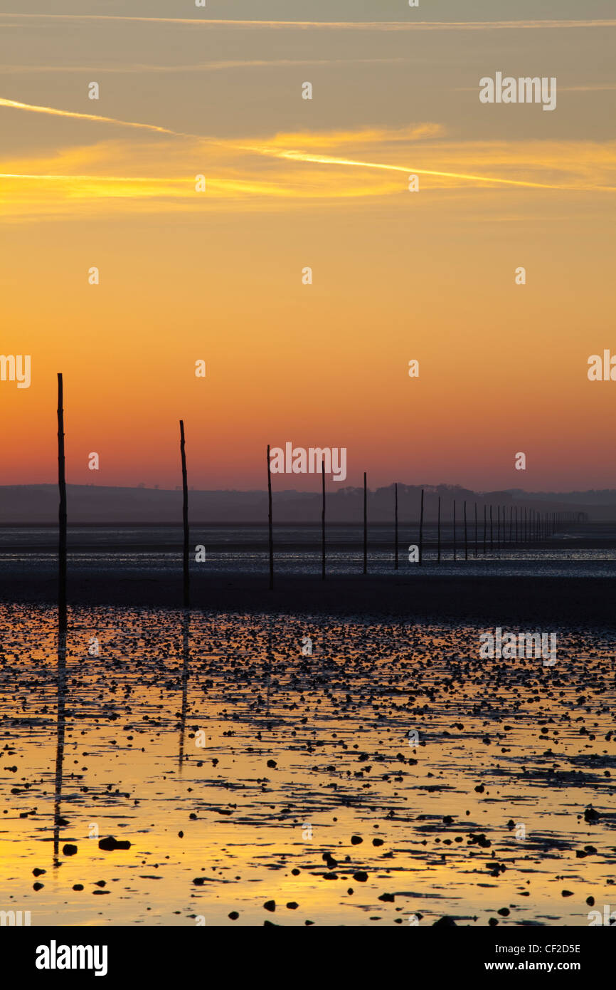 The Pilgrim's Causeway linking the Holy Island of Lindisfarne off the Northumberland Coast with the mainland. Stock Photo