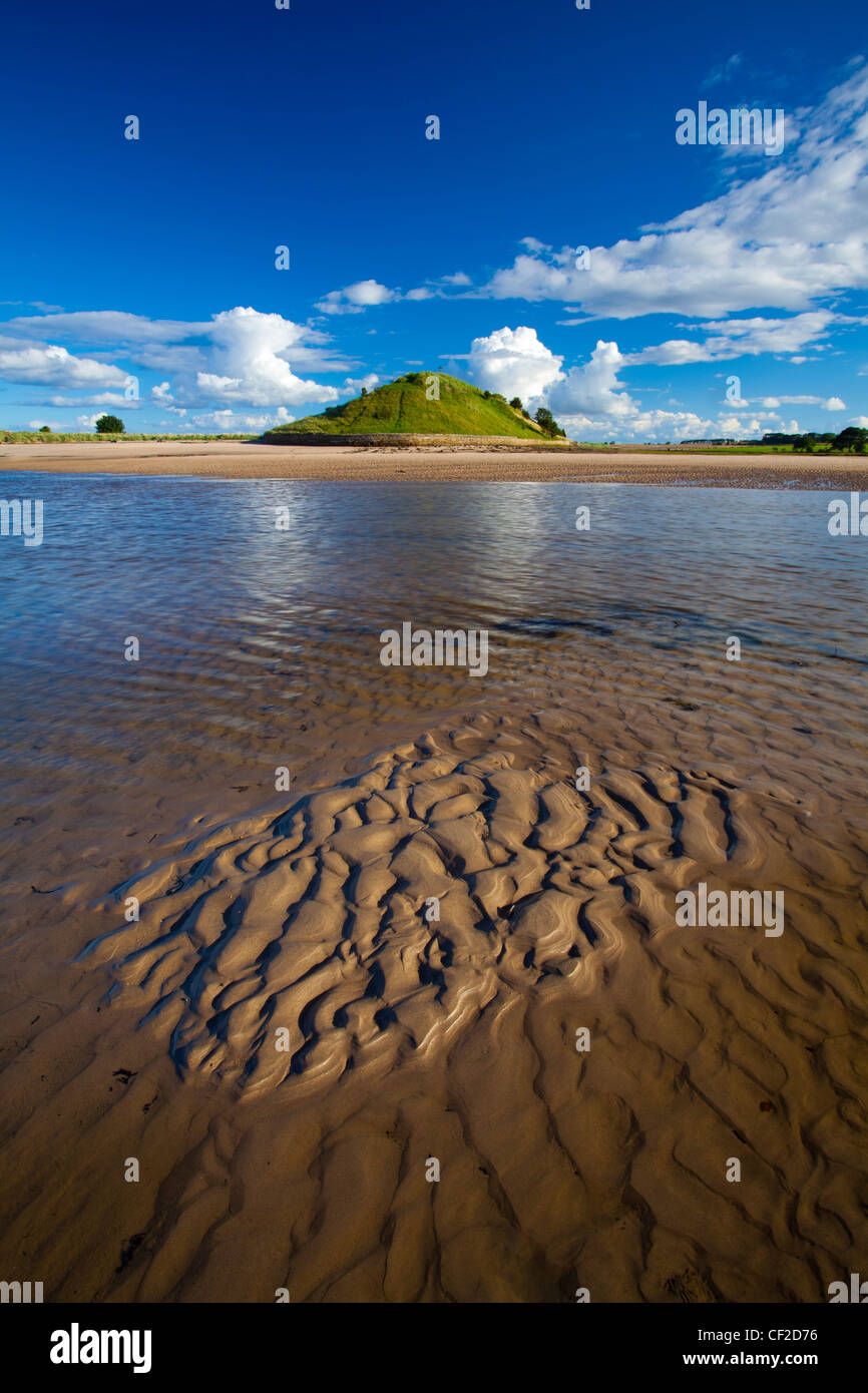 The tidal Aln Estuary at Alnmouth. The hill in the distance is known as Church Hill. Stock Photo