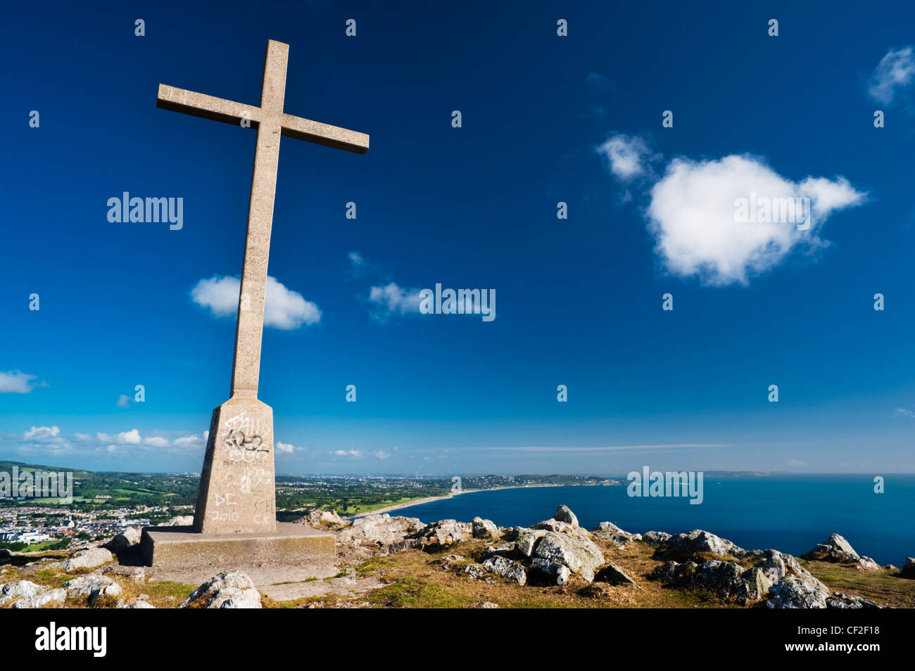 Cross on Bray Head, County Wicklow, Ireland, with Bray Town and Dublin City in the background Stock Photo