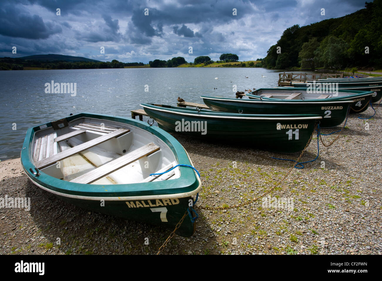 Rowing boats on the shore of the Talkin Tarn near Carlisle. Stock Photo