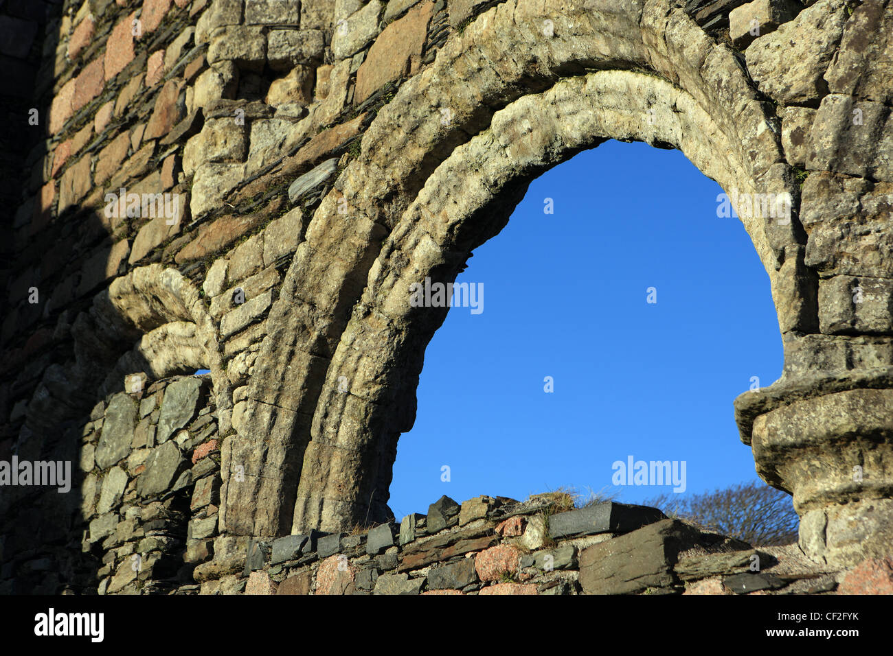 Archway with blue sky in Iona Nunnery on the Isle of Iona in the Inner Hebrides of Scotland Stock Photo