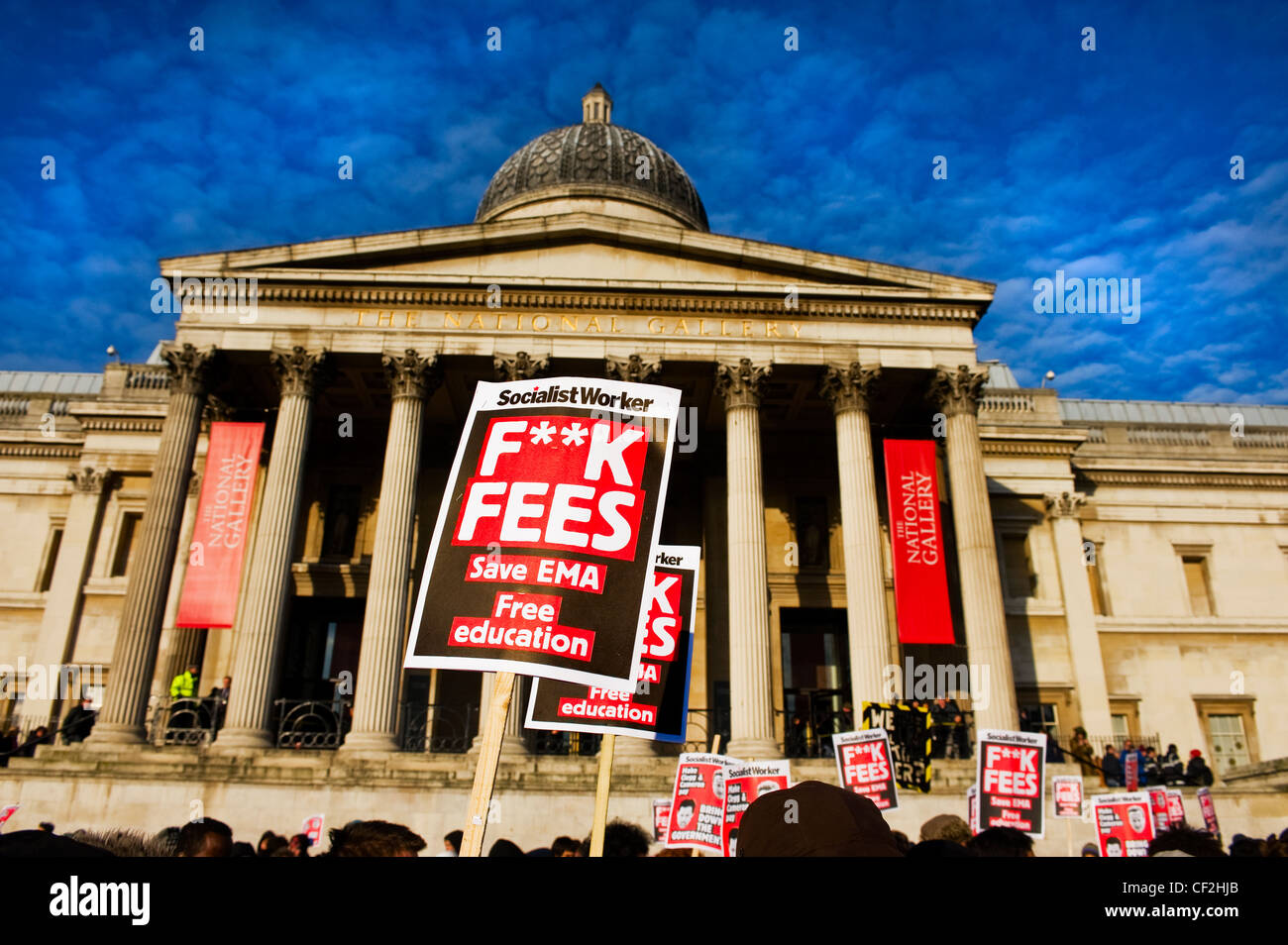 Students outside the National Gallery in Trafalgar Square demonstrating against government education cuts. Stock Photo