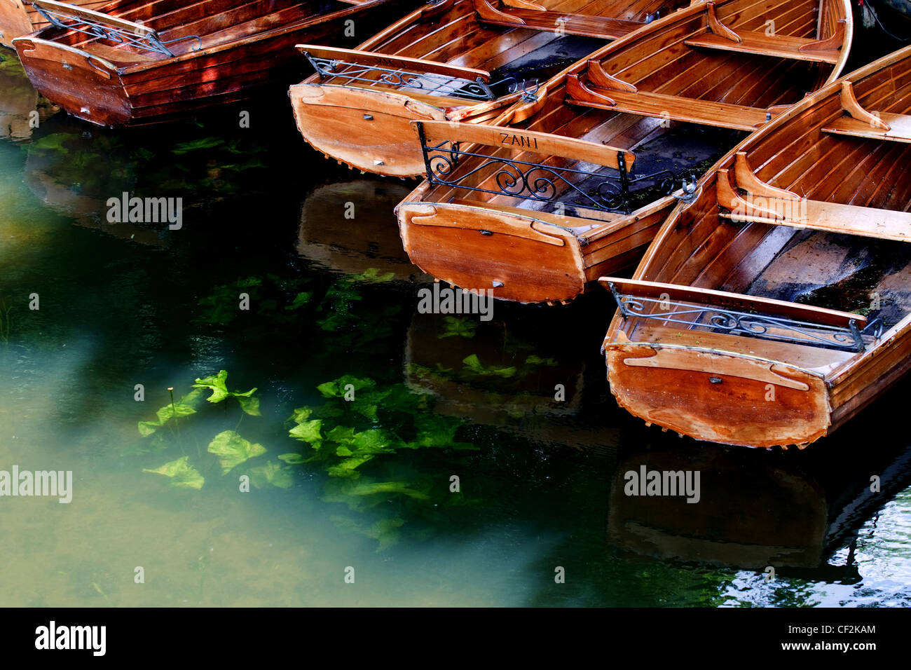 Rowing boats available for hire on the River Stour in Dedham Stock
