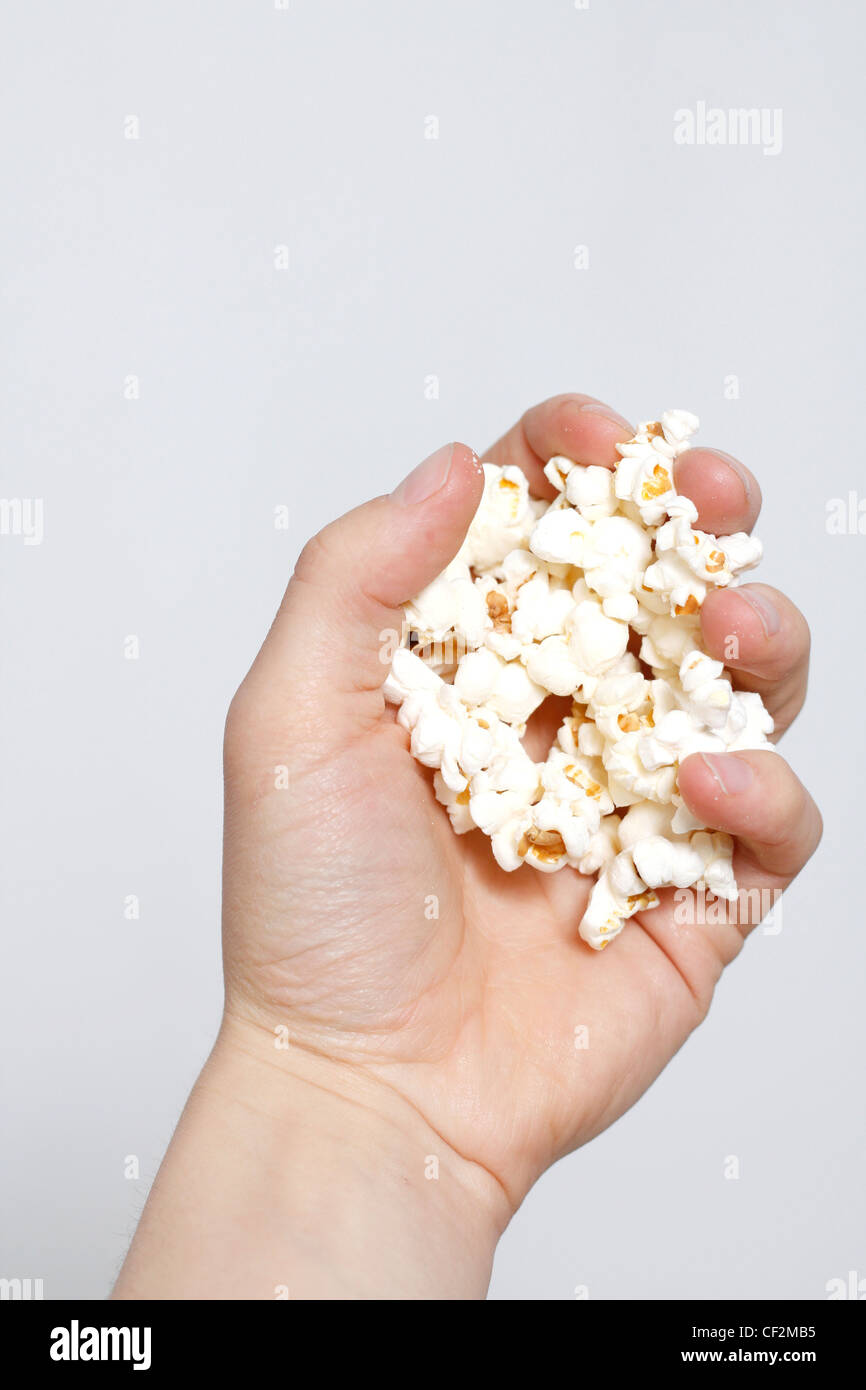 Handful popcorn hi-res stock photography and images - Alamy