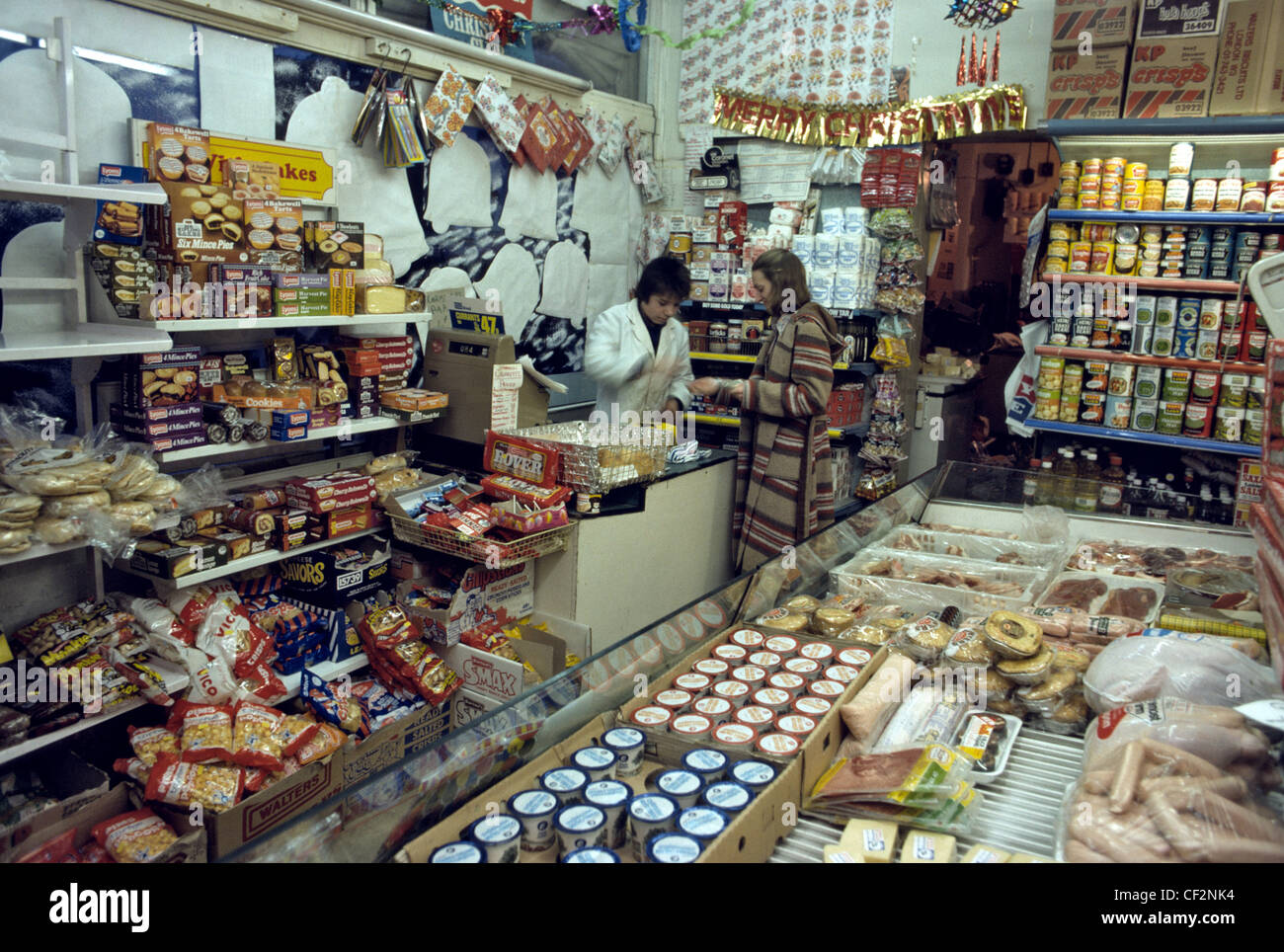 Typical small grocery store in the 1970's filled to ceiling with stock