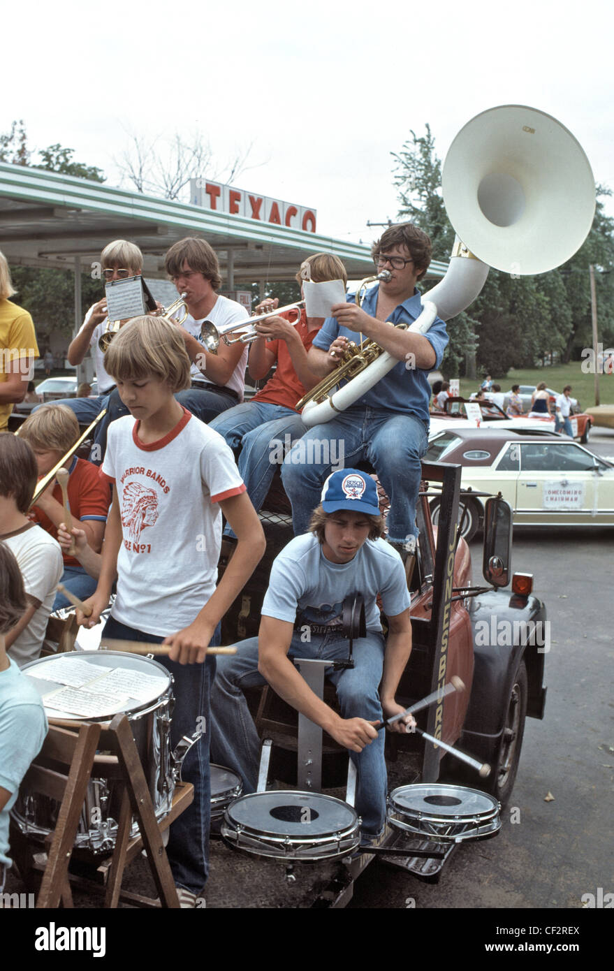 Children playing instruments on a float in the parade in
