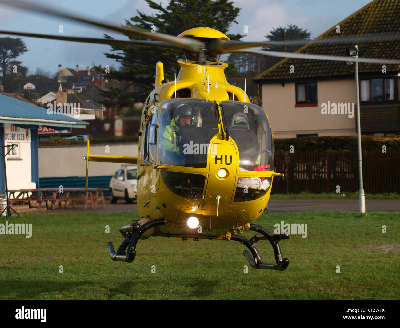 Yellow helicopter taking off, UK Stock Photo Alamy