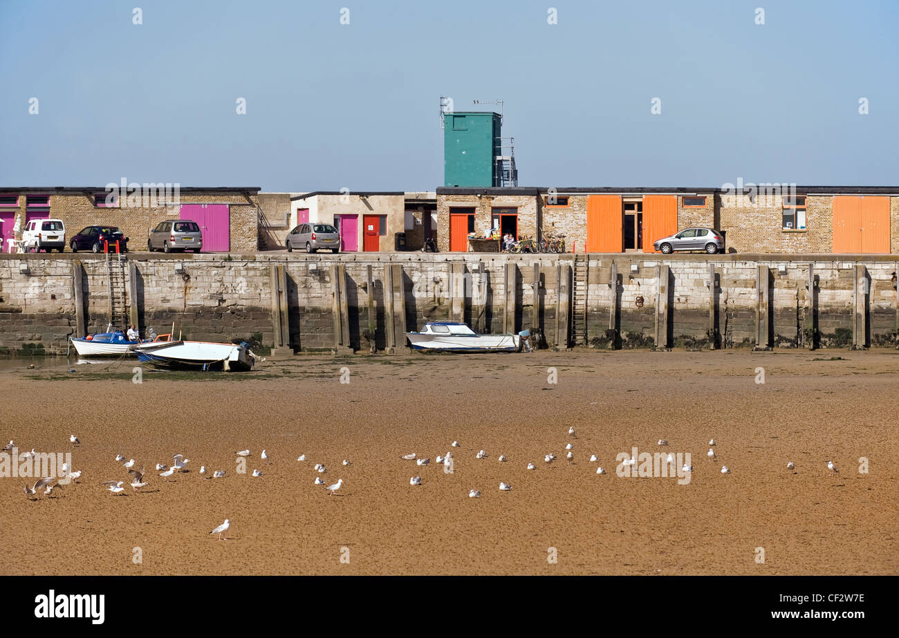 Small boats on the beach by Margate Jetty, now categorised as a lost pier after demolition of the pier following storm damage. Stock Photo