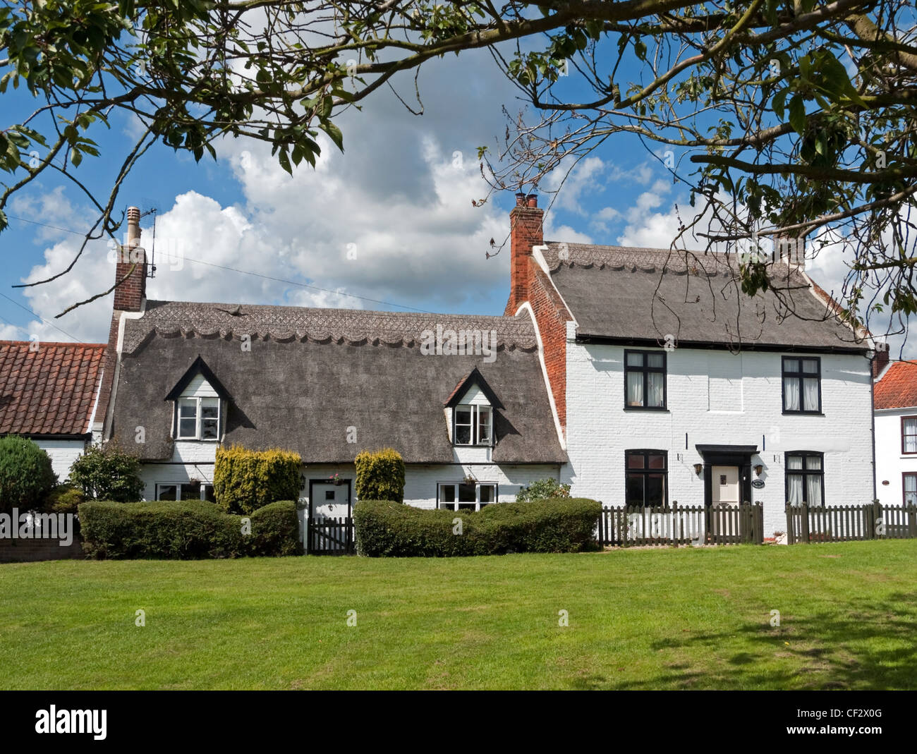Thatched Cottages on The Green in the historical village of Martham in