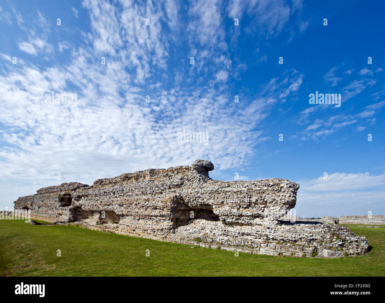 The remains of stone walls at Richborough Roman Fort, one of the most important Roman sites in the UK. Stock Photo