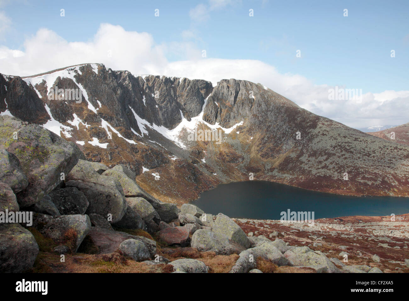 Lochan na Gaire in a corrie on Lochnagar in early spring. Stock Photo