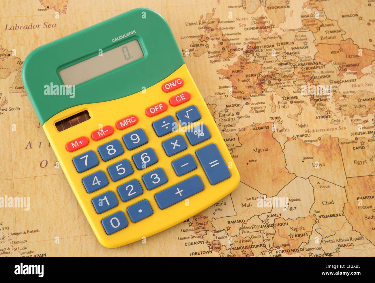 calculator with vintage looking map of Europe in studio Stock Photo
