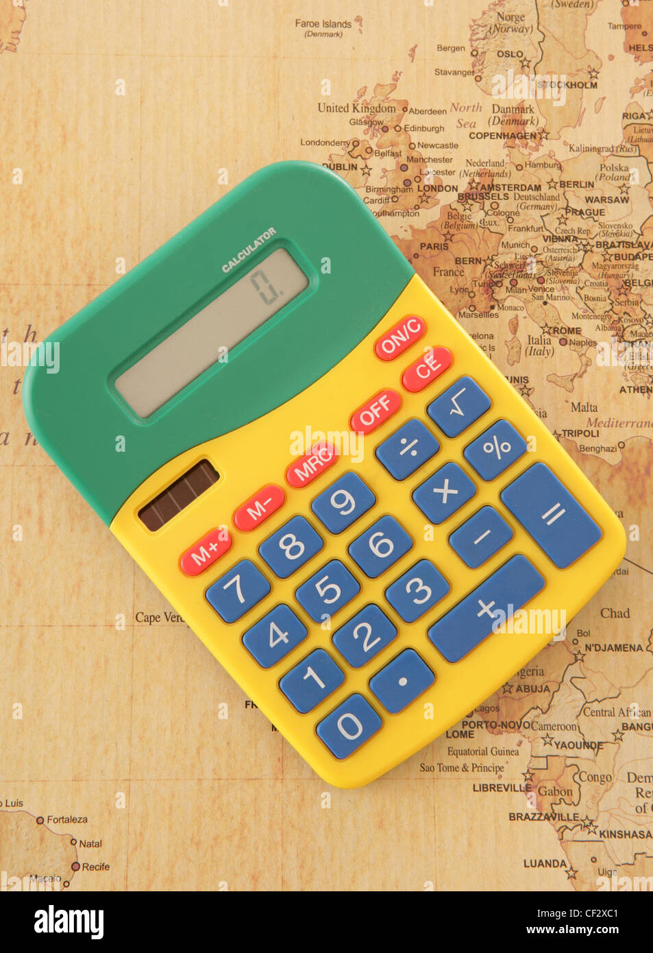 calculator with vintage looking map of Europe in studio Stock Photo