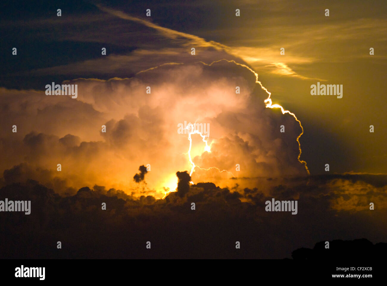 A storm cloud and a bolt of lightning over the Adriatic sea Stock Photo
