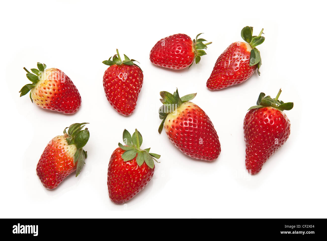 Strawberries isolated on a white studio background Stock Photo - Alamy