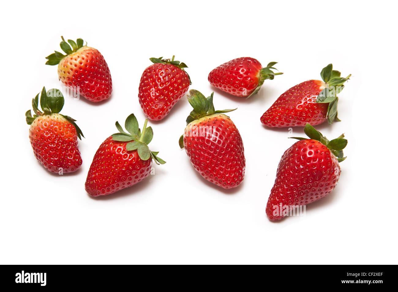 Strawberries isolated on a white studio background Stock Photo - Alamy