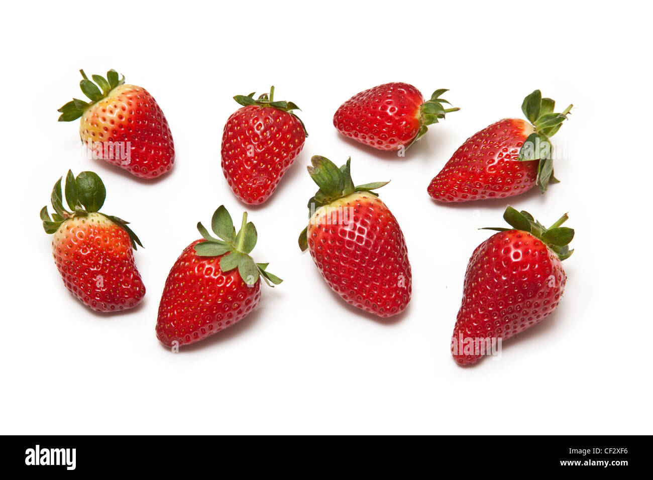 Strawberries isolated on a white studio background Stock Photo - Alamy