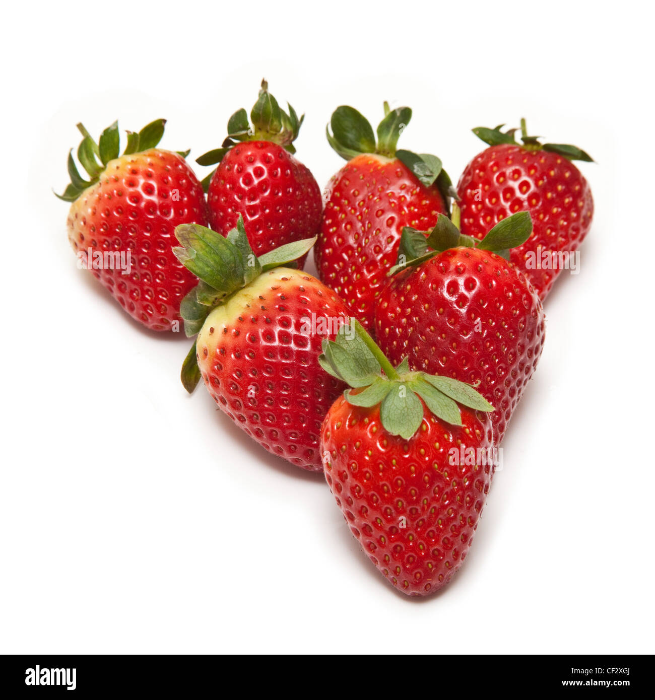 Strawberries isolated on a white studio background Stock Photo - Alamy