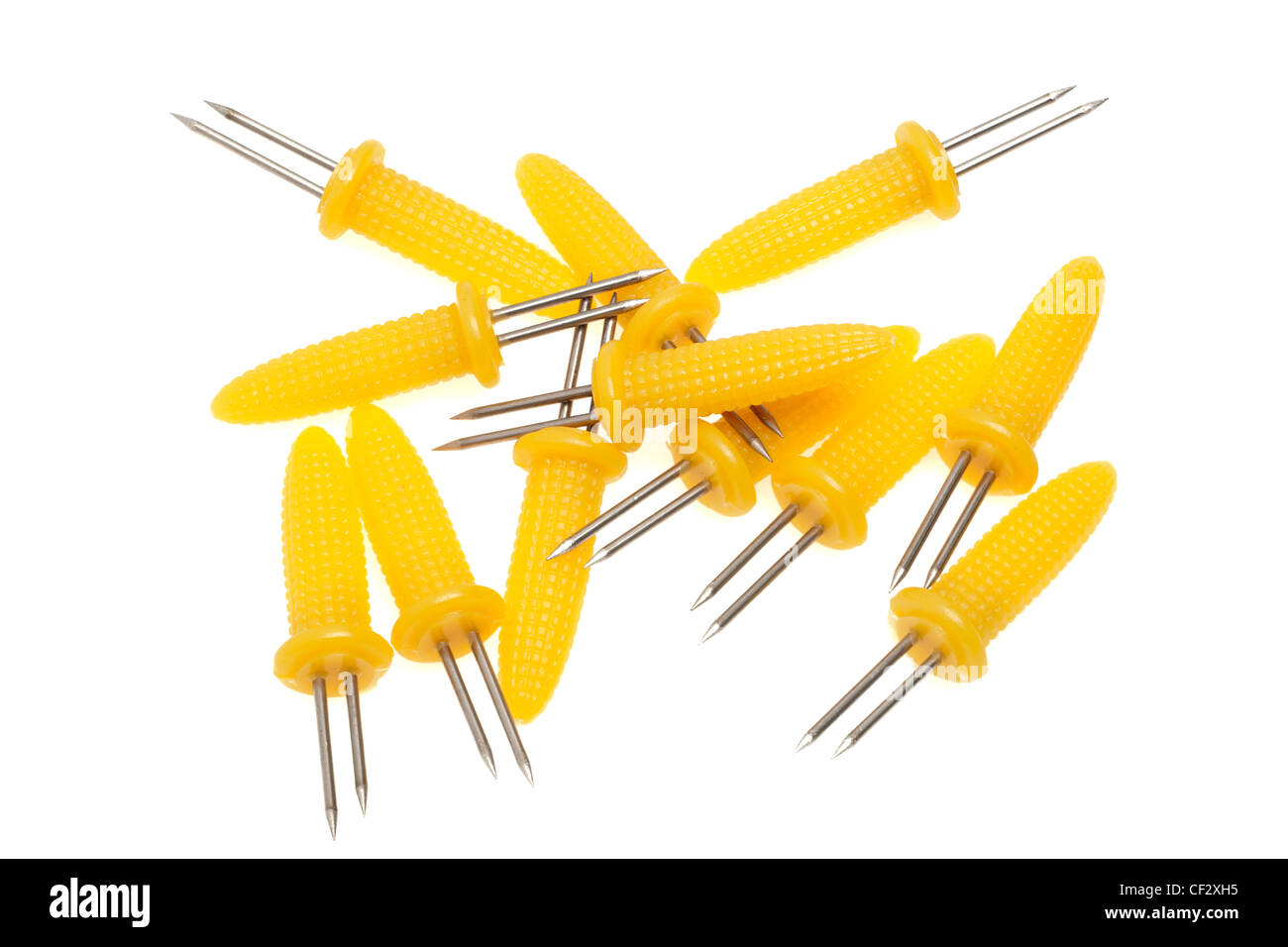 Pile of corn on the cob spike holders Stock Photo
