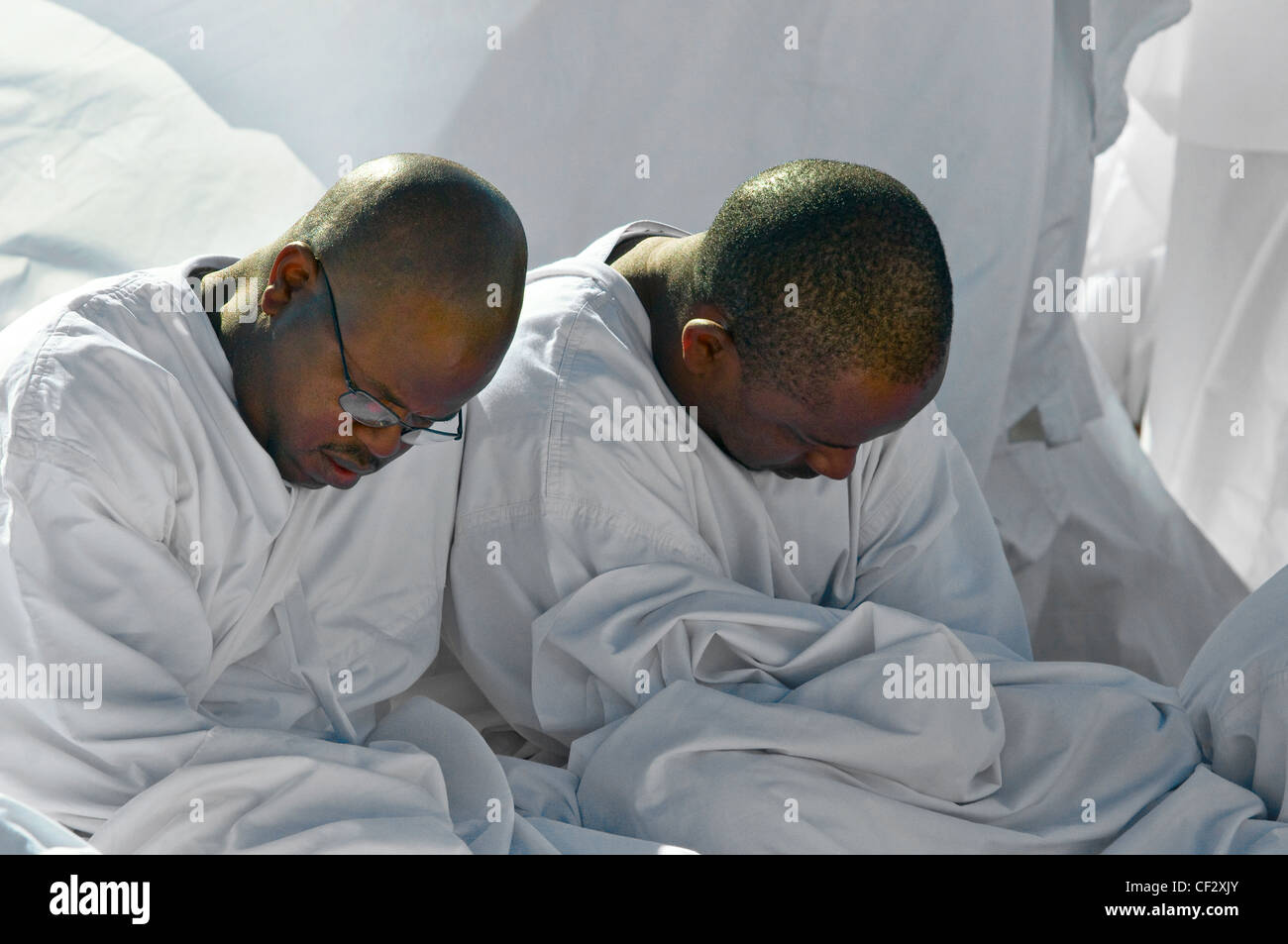 Two male members of the congregation of an apostolic church. Stock Photo