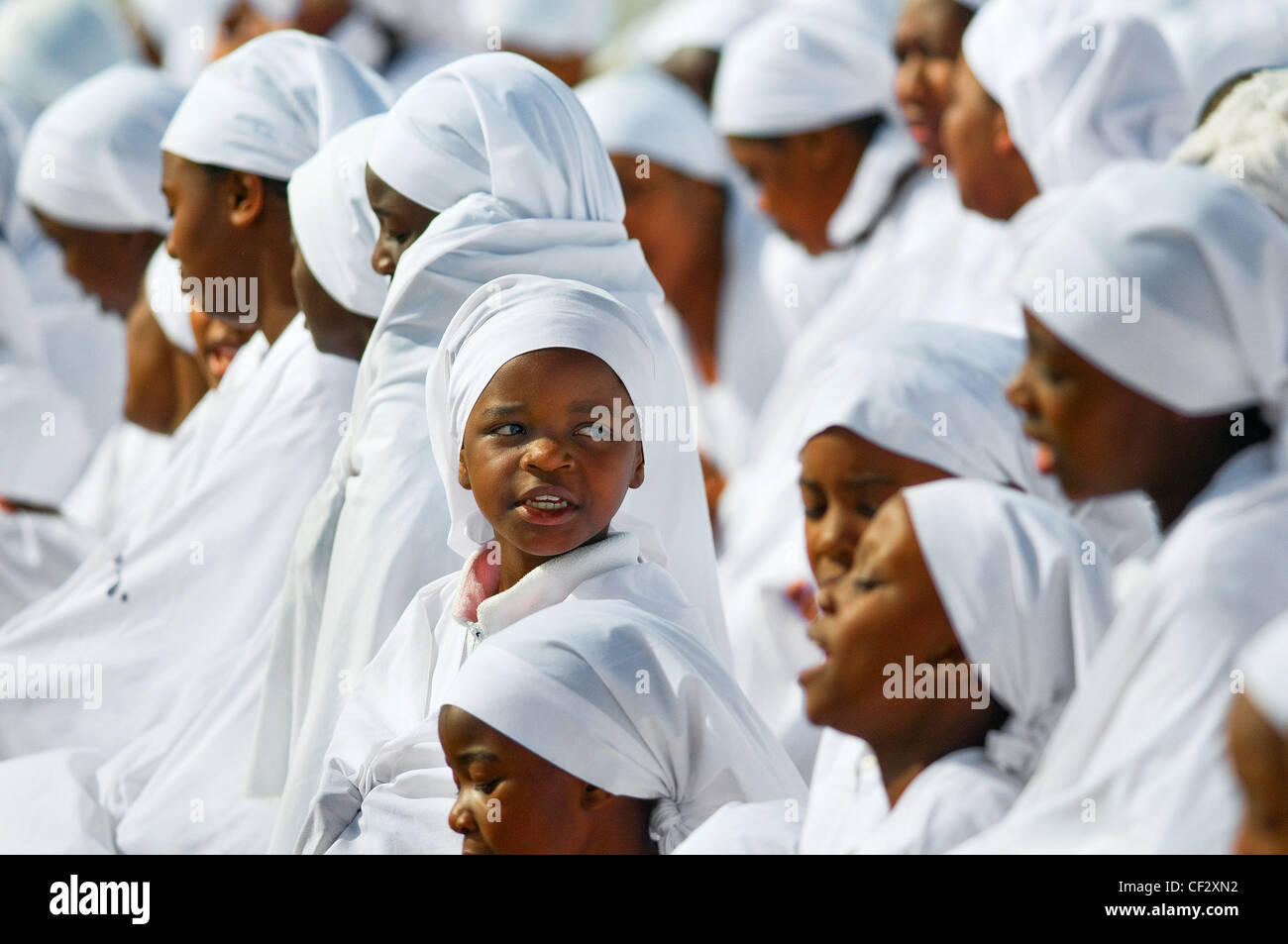 A young member of the female congregation of an apostolic church. Stock Photo