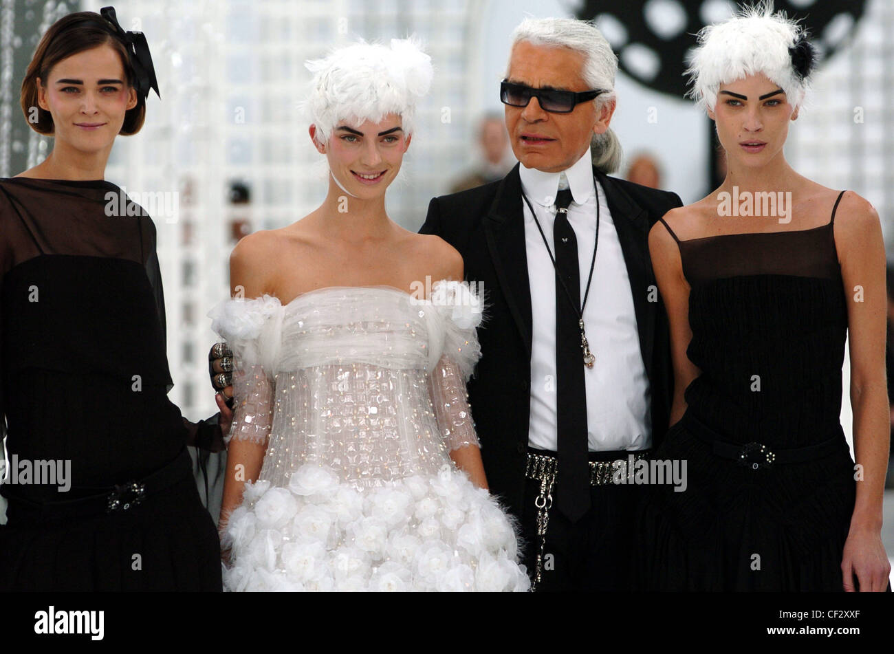 Chanel Paris Haute Couture Spring Summer German designer Karl Lagerfeld and  models Carmen Kass, left, and Erin Wasson, right Stock Photo - Alamy
