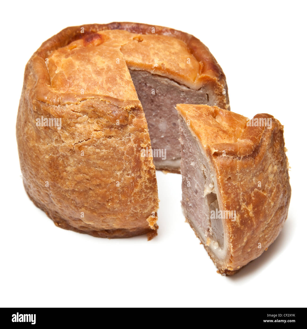 Melton Mowbray pork pie isolated on a white studio background. Stock Photo