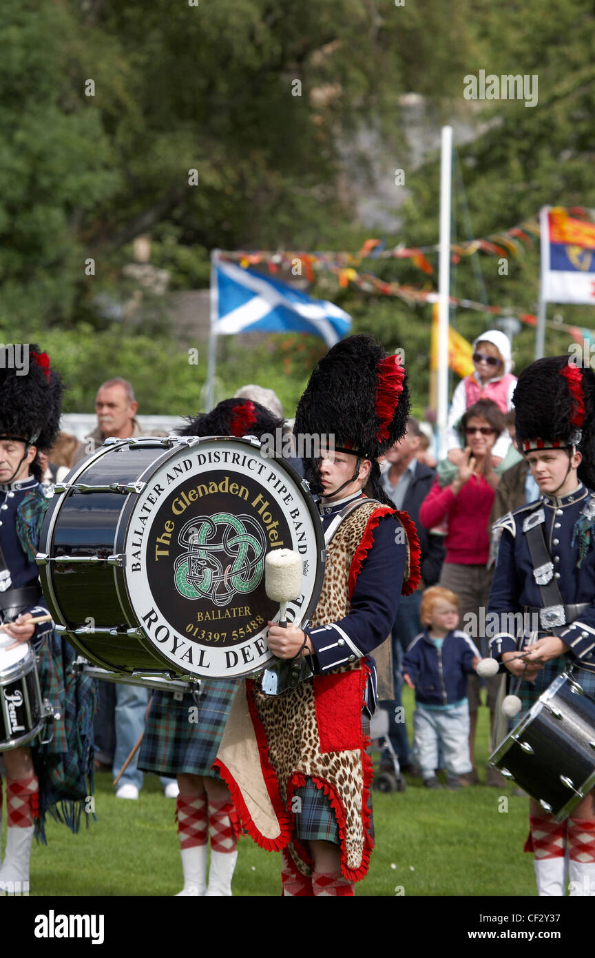 A drummer from The Ballater and District Pipe Band performing at the Lonach Gathering and Highland Games, (billed as ‚Äö√Ñ√≤Scot Stock Photo