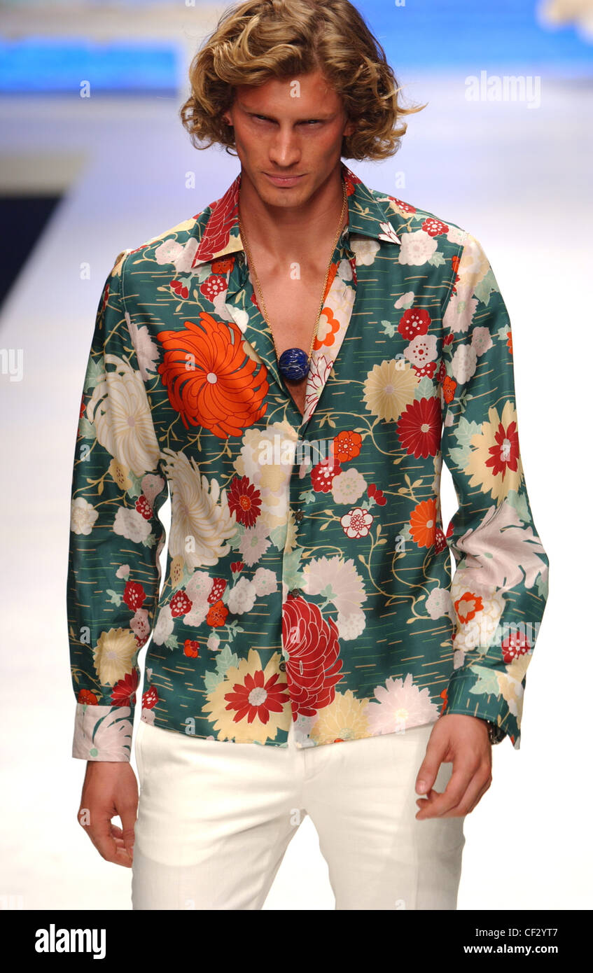Valentino Milan Menswear S S Blonde male wearing multicoloured flower print  silk shirt White runway Stock Photo - Alamy